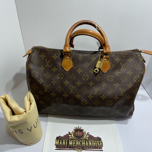 Louis Vuitton Speedy 35 in Monogram comes with lock , key and dust bag,preloved. - Picture 7 of 15